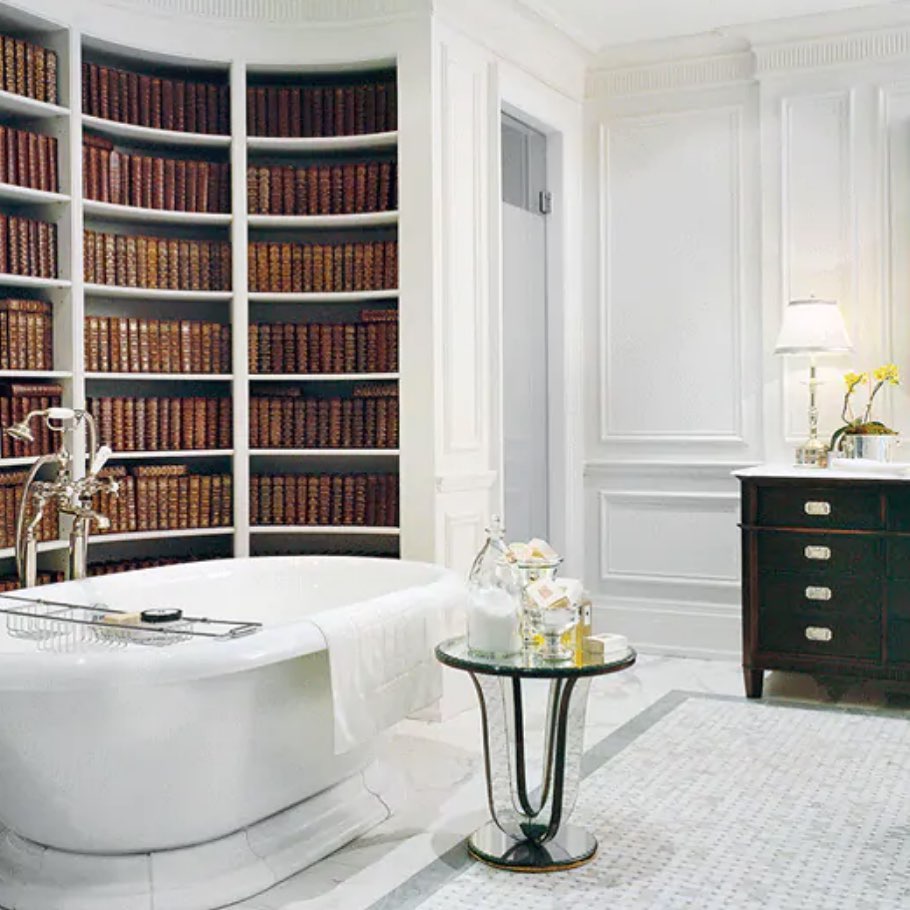 A unique bathroom design by Canadian Designer @briangluckstein - Brian’s style has a strong emphasis on symmetry and is effortlessly comfortable, neoclassical inspired, soft and neutral, always elegant, yet never boring due to the right mix of eclecticism – juxtaposed eras and materials. Says Brian himself: “The interest of a good interior is in the mix, the tension between contemporary and past designs” - Check out the full interview on www.lifeMstyle.com - link on profile 
.
.
.
.
.
#briangluckstein #brianglucksteindesign #glucksteinhome #ivanmeade #lifemstyle #lifemstyleblog #interiordesign #canadiandesigner #canadianinteriors #instadesign #picoftheday #bathroom #bathroomdesign #library #fireplace